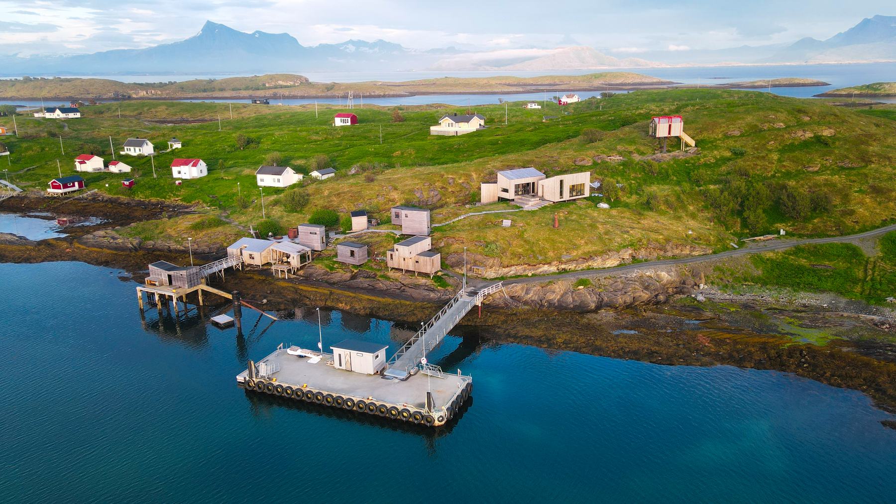 Fleinvær from the air: the harbour, houses and the Hideaway
