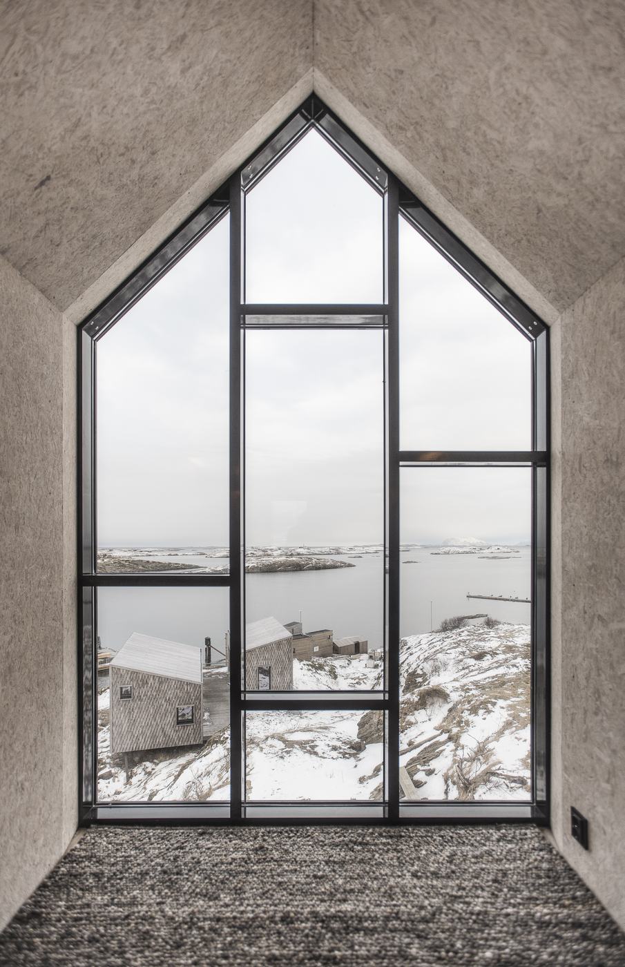 The gable window of the Tower House, snow outside