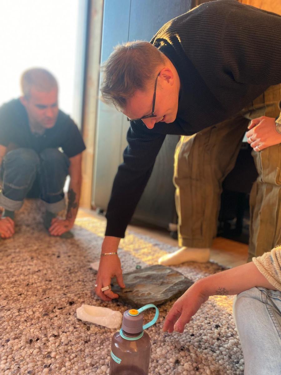 Harrison and other artists working on the studio floor